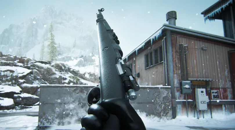 Warzone player holding Kar98k marksman rifle with a building in background